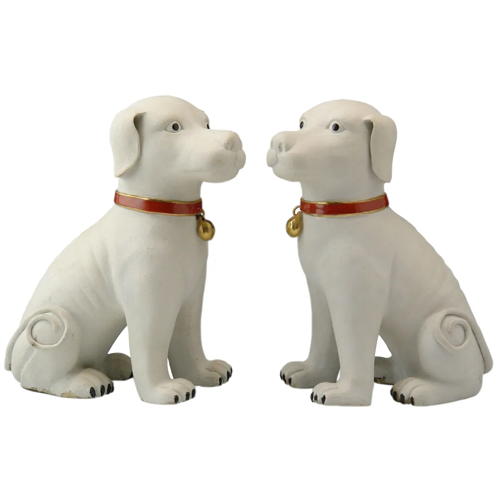 A PAIR OF 11” WHITE DOGS